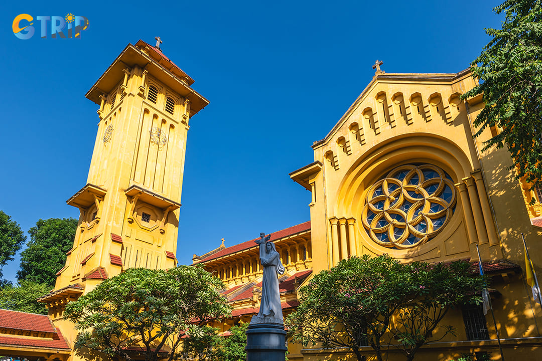 Cua Bac Church in Hanoi showcases Indochine architecture with its bold asymmetrical design, Art Deco lines, and Vietnamese pagoda-inspired roof tiles