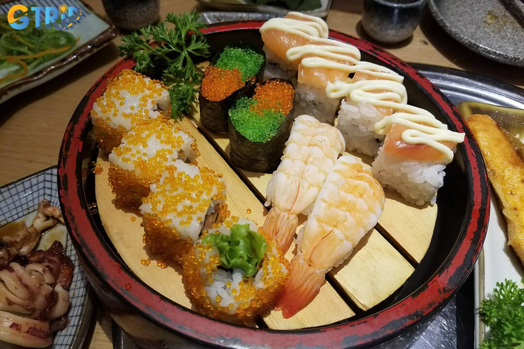 iSushi is a leading Japanese buffet chain in Hanoi, offering over 100 authentic dishes across 10 modern locations