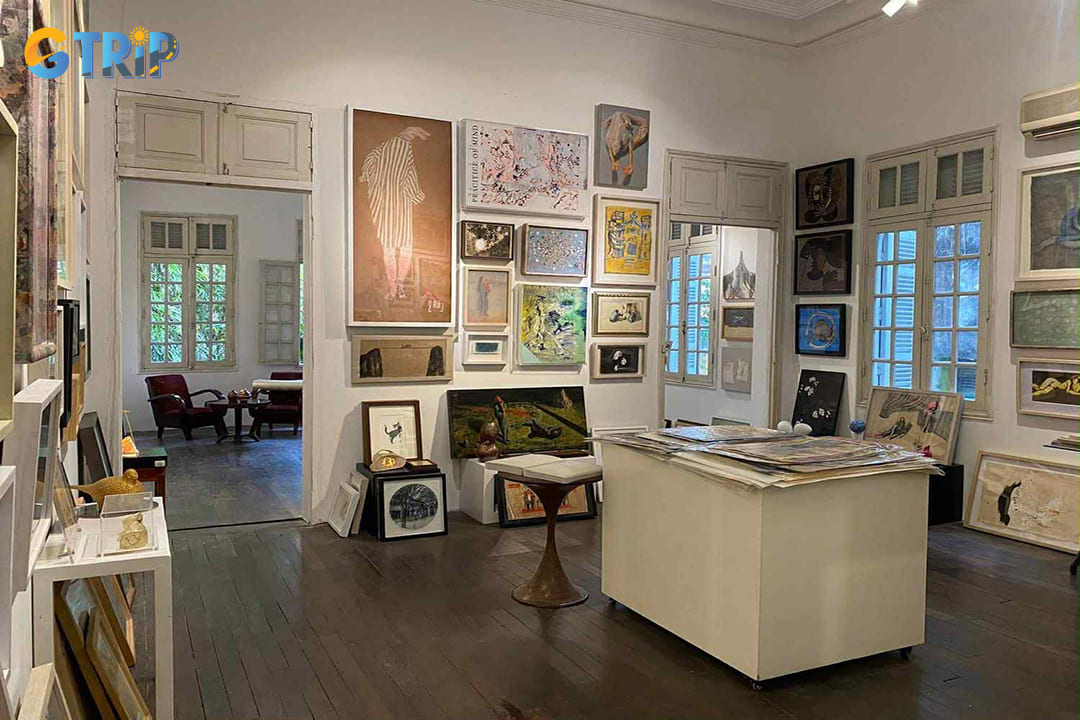 Manzi, set in a restored French villa, is a vibrant cultural hub blending gallery, cafe, and event space, showcasing bold contemporary Vietnamese art