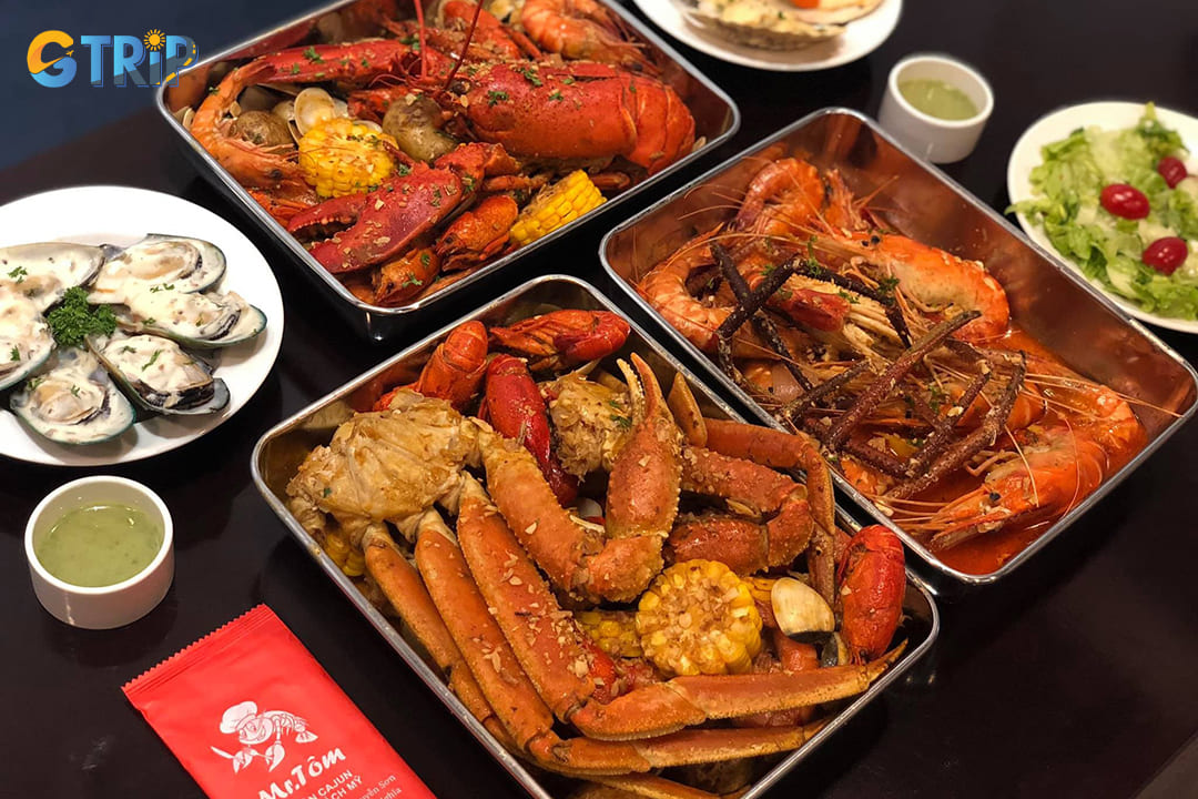 Mr. Tom in Hanoi serves up bold American-style Cajun seafood boils with shrimp, crab, and crawfish tossed in spicy sauces for a fun, hands-on feast