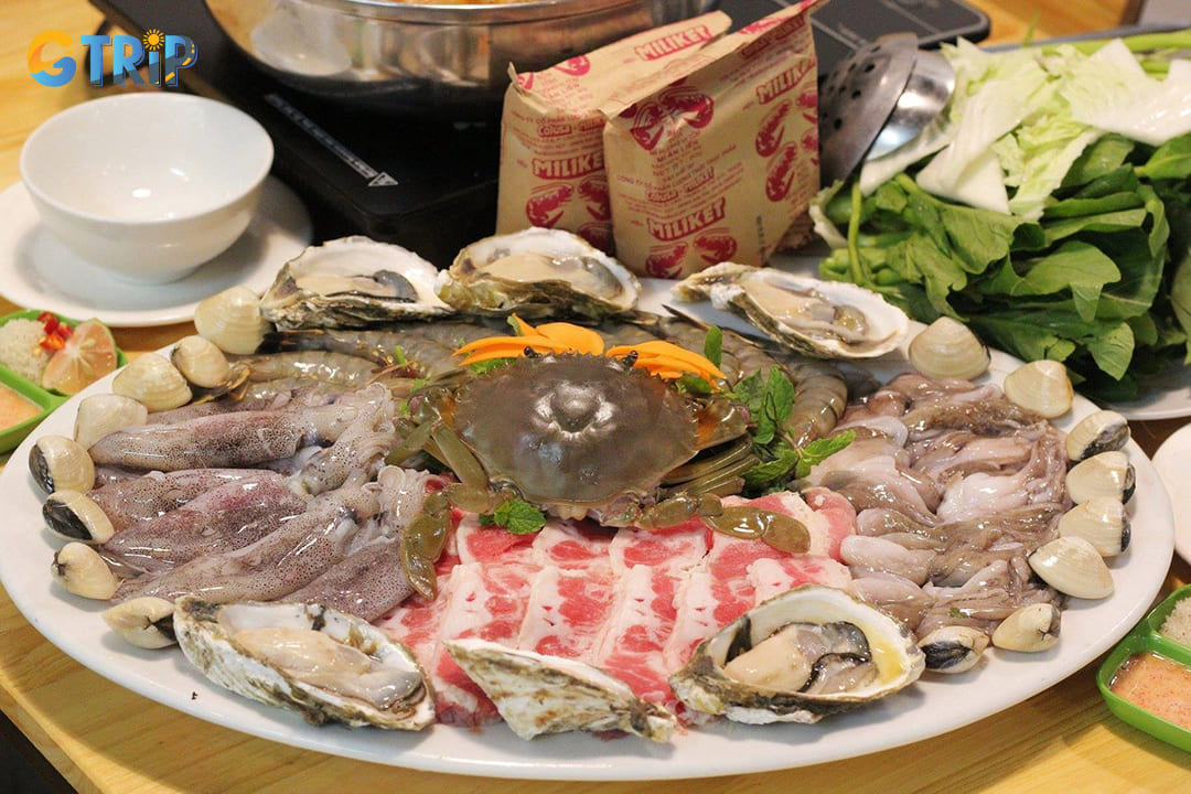 Tadifar in Hanoi is a student-favorite hotpot spot, serving fresh, customizable seafood with flavorful broths in a lively, budget-friendly setting