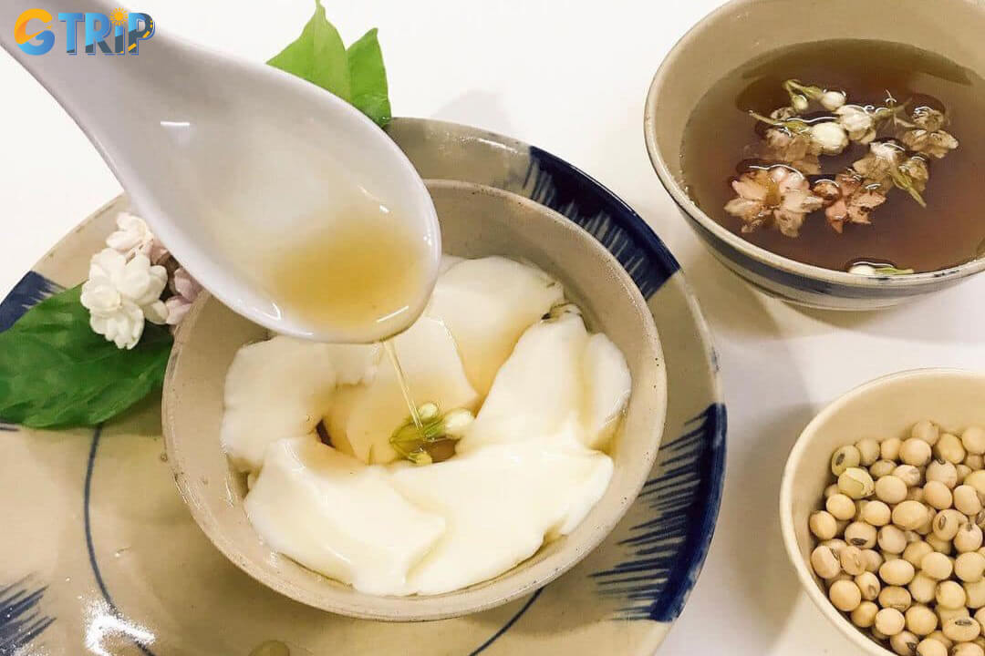 Tao pho hoa nhai is a silky tofu pudding in jasmine syrup, a fragrant and refreshing Hanoi street dessert