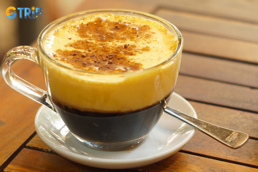 You can start your walking tour in Hanoi with a cup of egg coffee