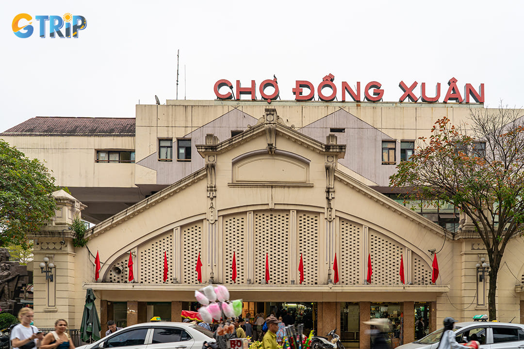 You should visit Dong Xuan Market to go shopping