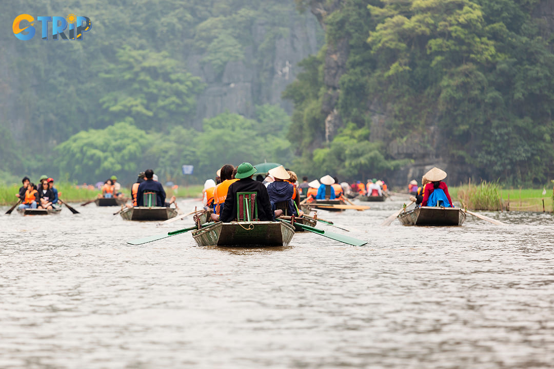 A boat ride in Tam Coc offers a peaceful and scenic way to explore