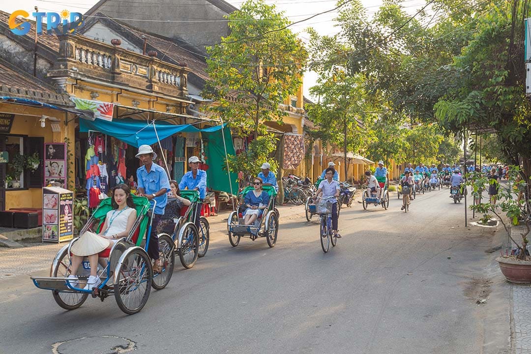 A cyclo ride through Hoi An Old Town offers a slow, front-seat perspective of the pedestrian streets