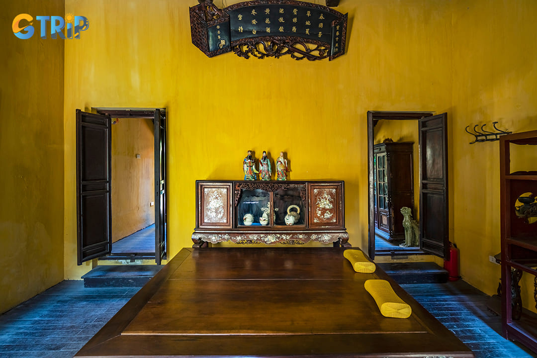 A few minutes away on foot, the Ancient House at 87 Ma May Street offers a rare glimpse into 19th-century urban life in Hanoi