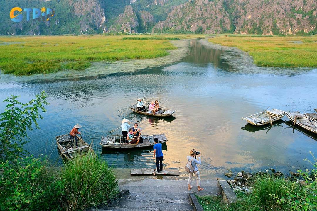 A great way to experience Ninh Binh is by taking a boat ride through its stunning landscapes