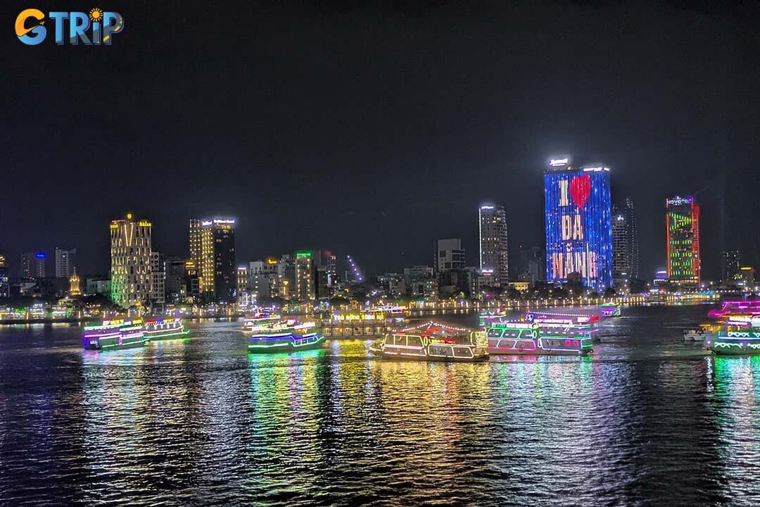 A Han River night cruise near Love Bridge offers a scenic hour-long journey past illuminated landmarks like the Dragon Bridge and Han River Swing Bridge