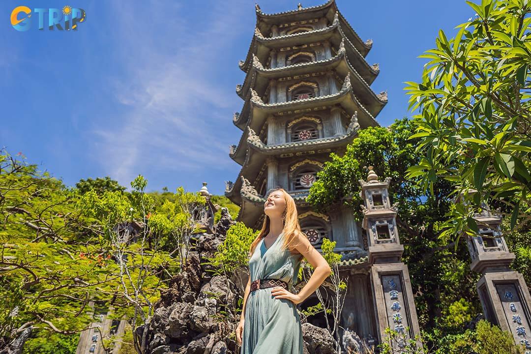 A paradise for photographers, the pagoda offers striking symmetry, ancient stone details, dramatic cave lighting, and stunning contrasts against the marble cliffs