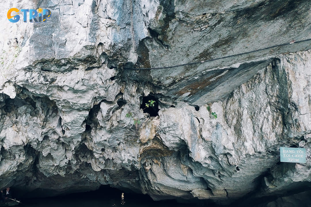 Admire the rock formations of Dark Cave