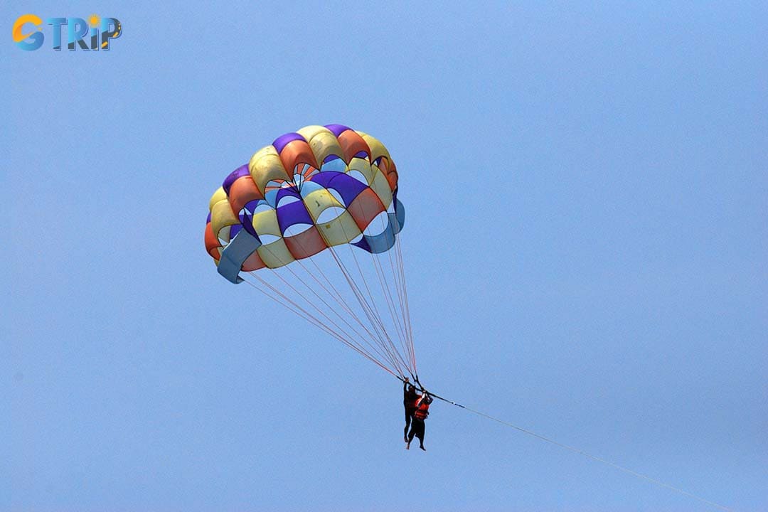 An Bang Beach parasailing offers a unique perspective of the coastline dotted with fishing boats