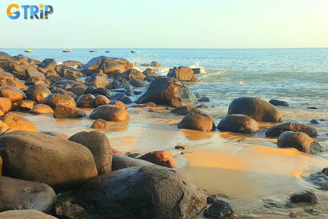 Bai But Beach captivates photographers with its striking blend of forested mountains, white sand, blue waters, and iconic coastal scenery