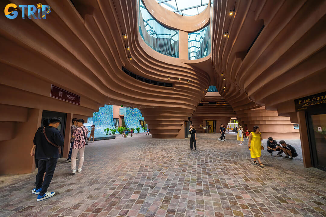 Bat Trang Pottery Museum celebrates 700 years of ceramic art in a wheel-shaped modern building, offering hands-on experiences, rare artifacts