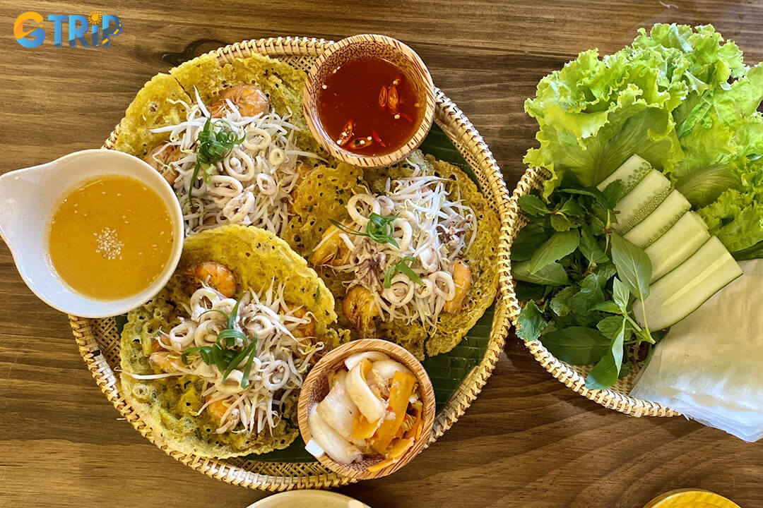 Bep Cuon Saigon serves light, delicate Central-style Banh Xeo with fresh fillings and herbs in a modern, comfortable setting