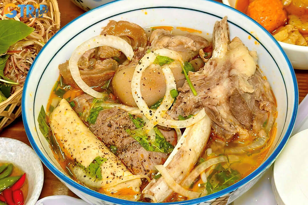 Bun bo is a hearty Hanoi breakfast soup with tender beef, vermicelli noodles, and a savory broth subtly infused with lemongrass and herbs