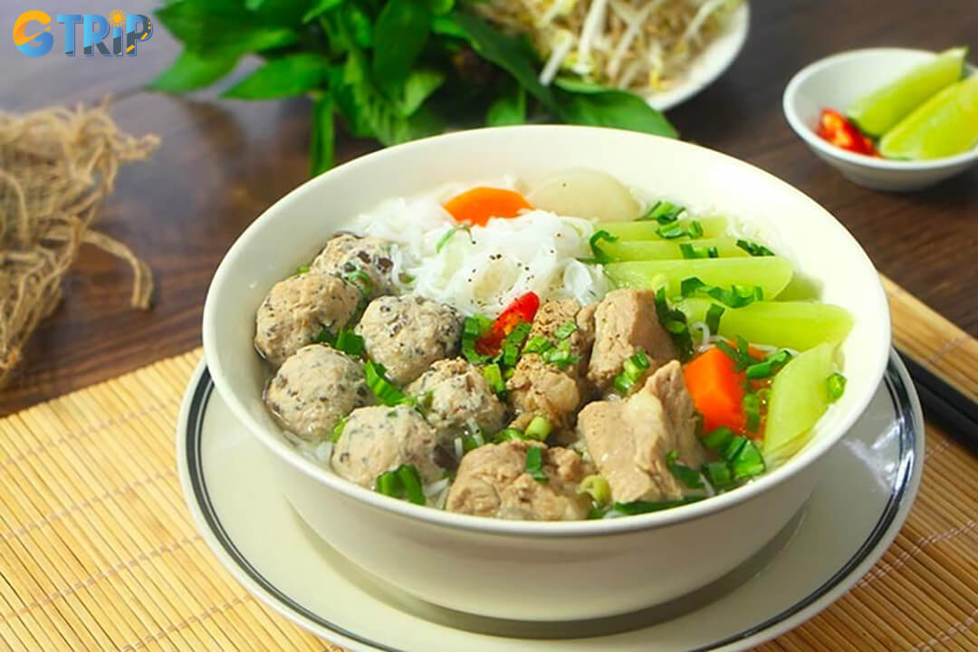 Bun doc mung is a light Hanoi noodle soup featuring taro stems, fresh herbs, and a delicate broth, perfect for a refreshing yet satisfying start to the day