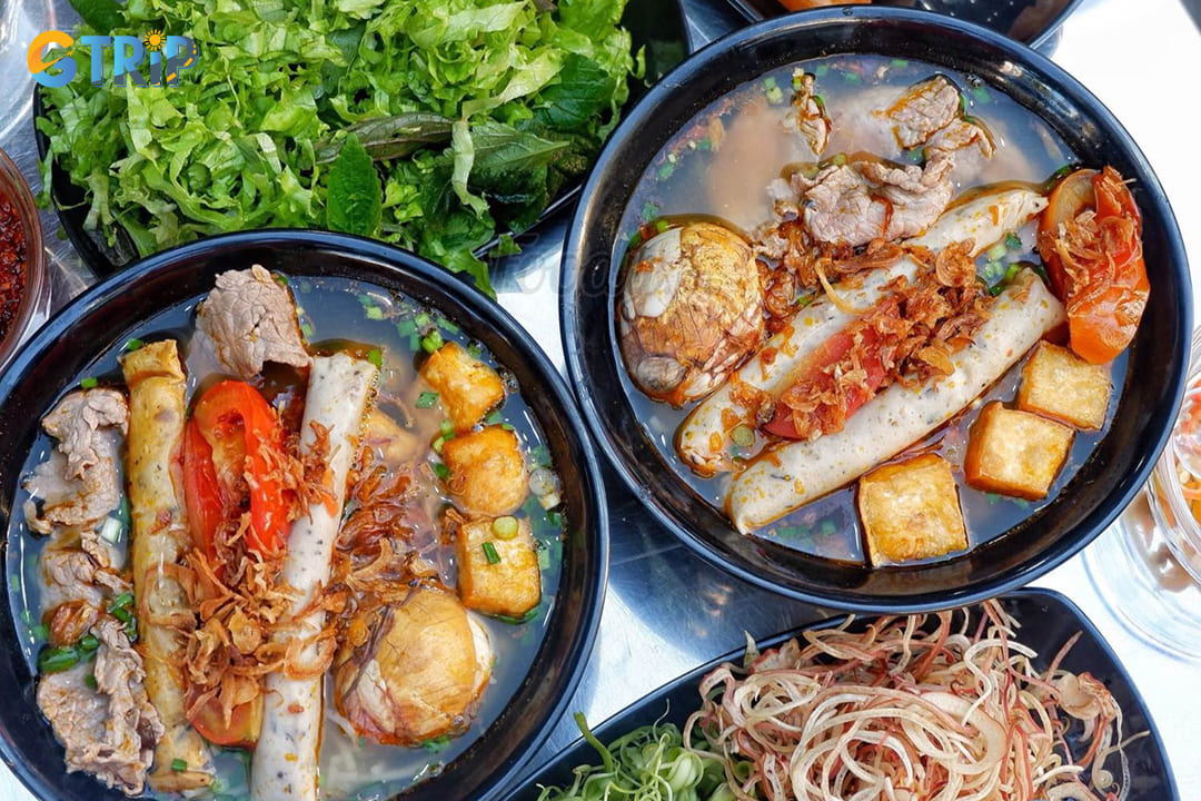 Bun rieu is a tantalizing Vietnamese crab-based noodle soup that captures the essence of Hanoi's culinary traditions