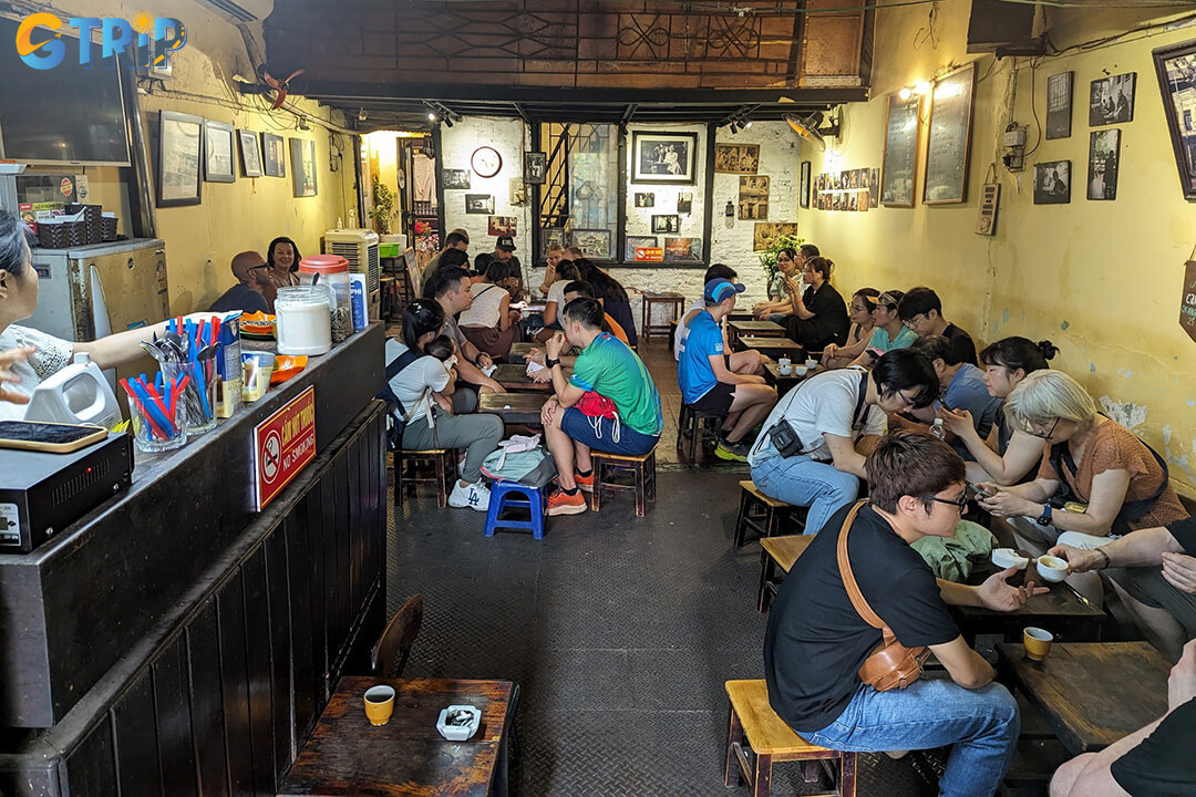 Cafe Dinh is a beloved Hanoi cafe serving authentic egg coffee in a cozy, nostalgic space that reflects decades of cultural history