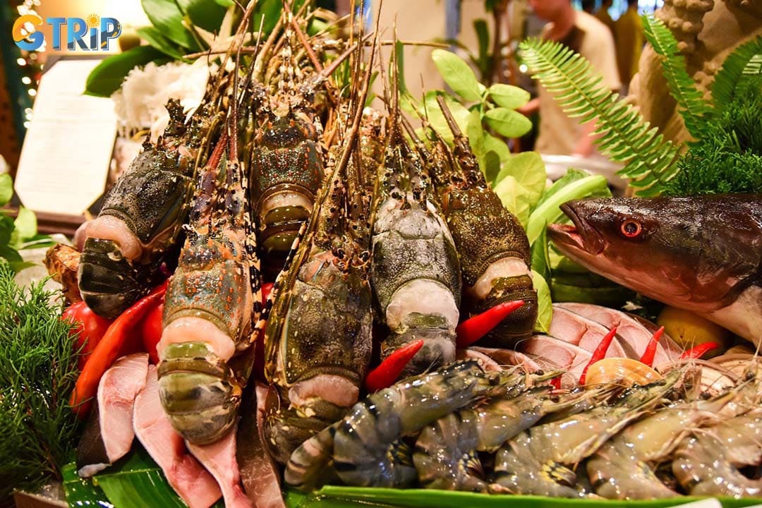 Cafe Indochine is a luxury buffet restaurant inside Furama Resort Danang, famous for fresh seafood, steak dinners, and live cooking stations