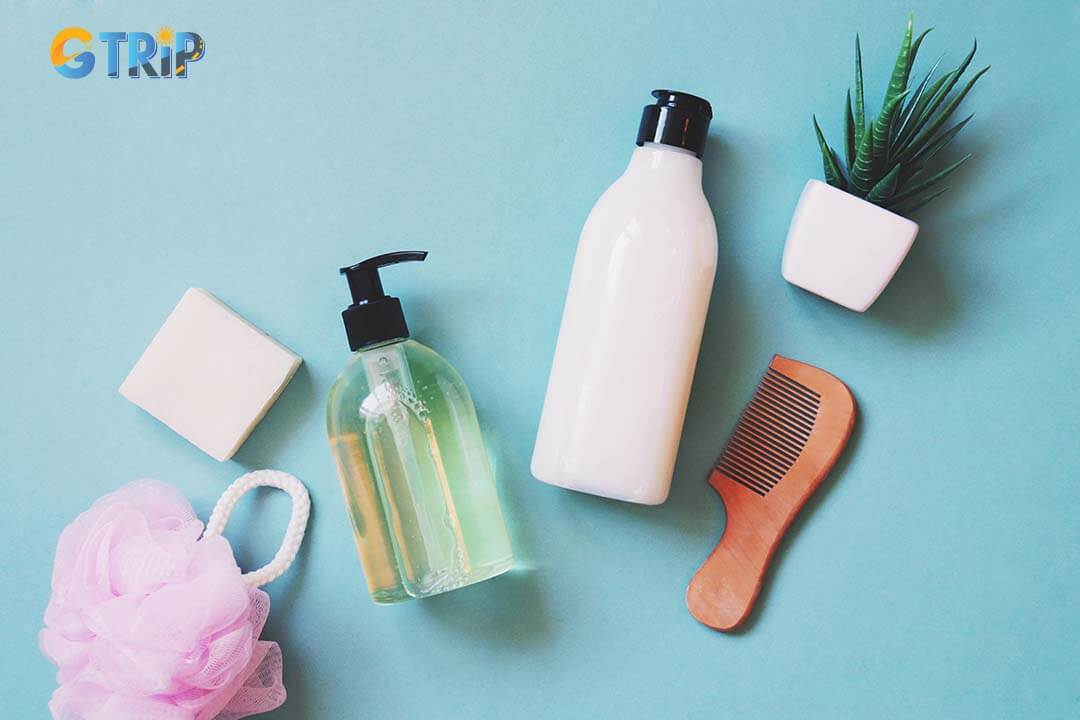 Choosing solid toiletries like shampoo bars, toothpaste tablets, and deodorant sticks to save space and comply with airline liquid restrictions