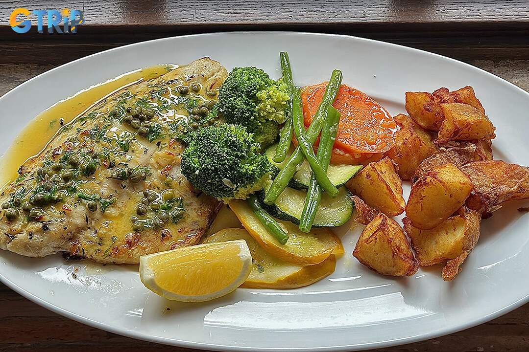 Ciao Bella is a lively Italian trattoria in District 1, renowned for its warm atmosphere, homestyle dishes, and standout black truffle tagliatelle