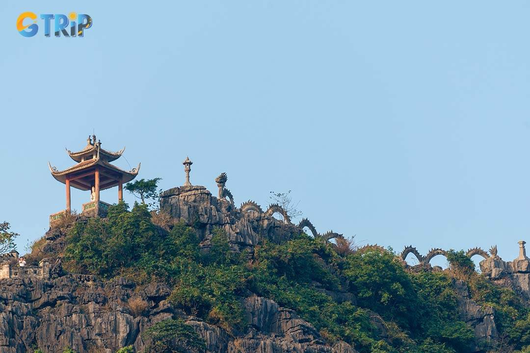 Climb up Mua Cave 500 steps for breathtaking views of Tam Coc’s valley, crowned by the iconic dragon statue at the summit