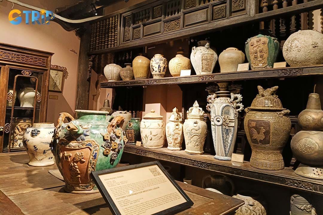 Collection of wine jars showcases the traditional art of brewing medicinal liquor, featuring the unique “buried jar” technique used to enhance its flavor and potency