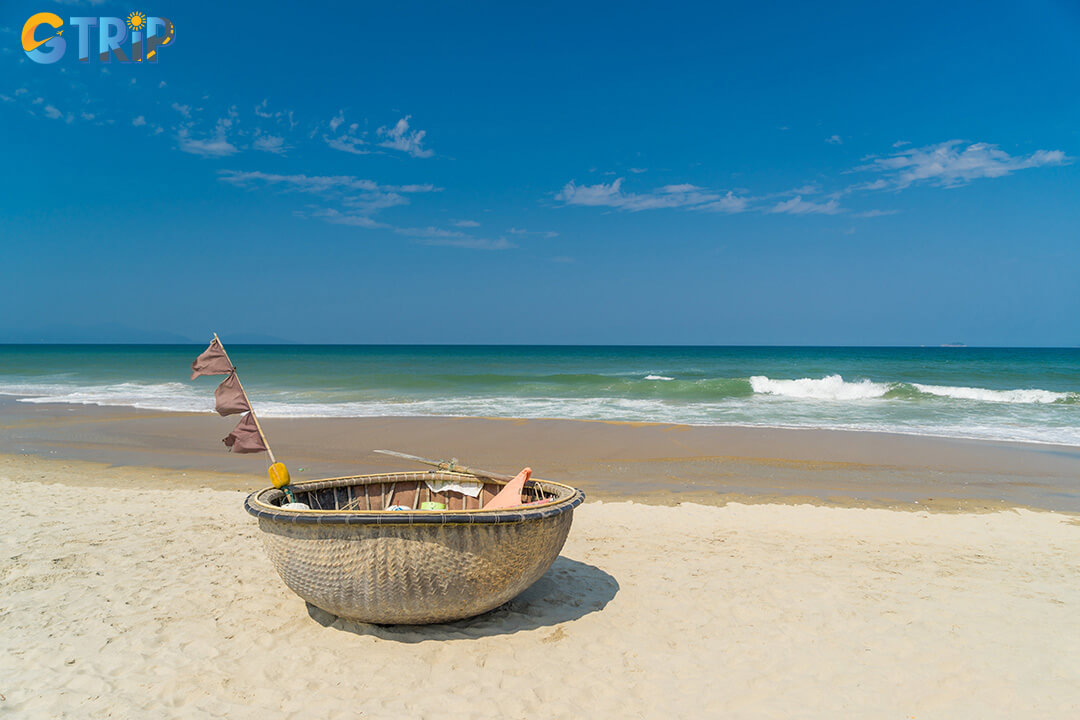 Colorful basket boats line the shore, offering a picturesque glimpse of local life and a chance to try paddling one yourself