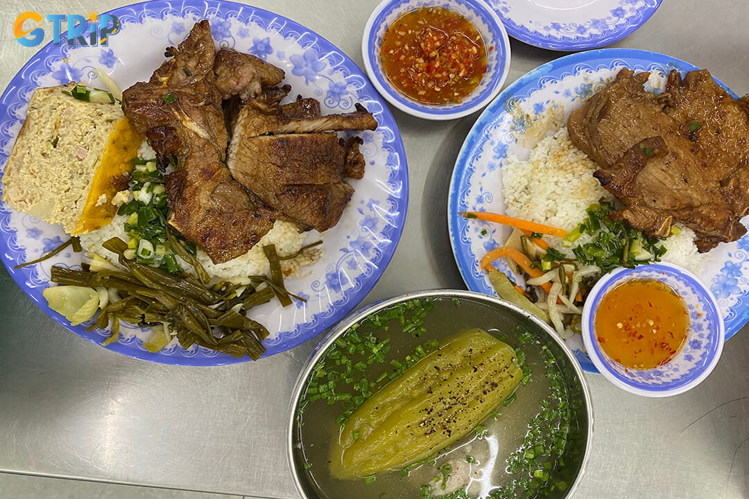 Com Tam Hoa in former District 6 is a bustling evening spot serving affordable, flavorful com tam elevated by its exceptional, perfectly balanced fish sauce
