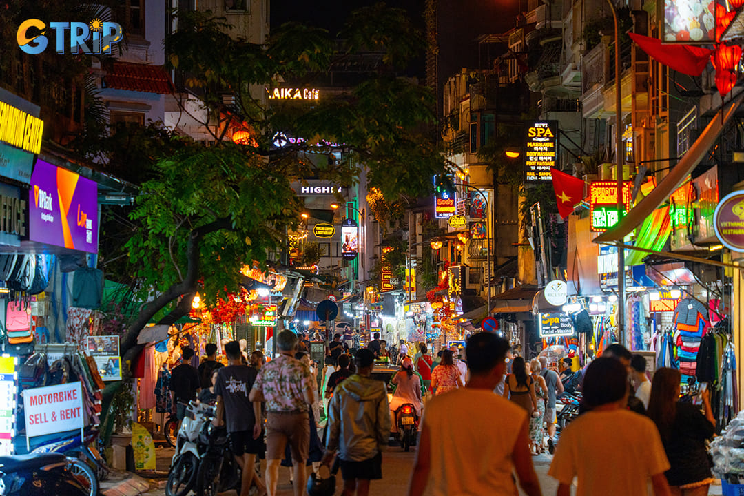 Crowded street at night in Ha Noi is different from Ninh Binh nightlife