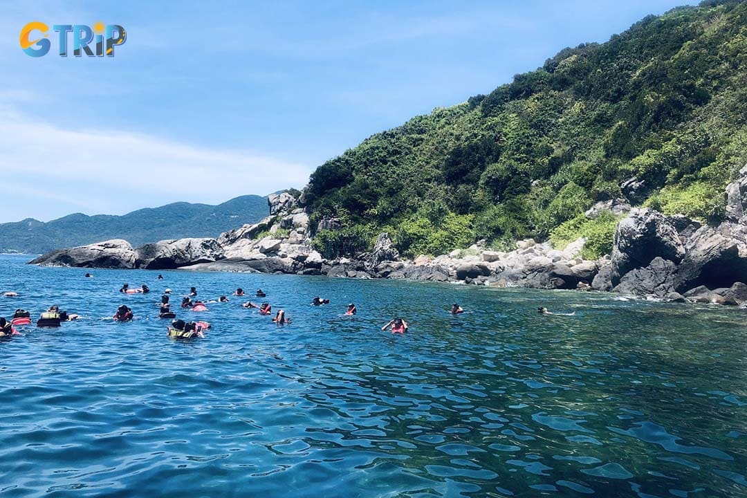 Cu Lao Cham is a UNESCO-listed island group known for pristine beaches, clear turquoise water, and vibrant coral reefs