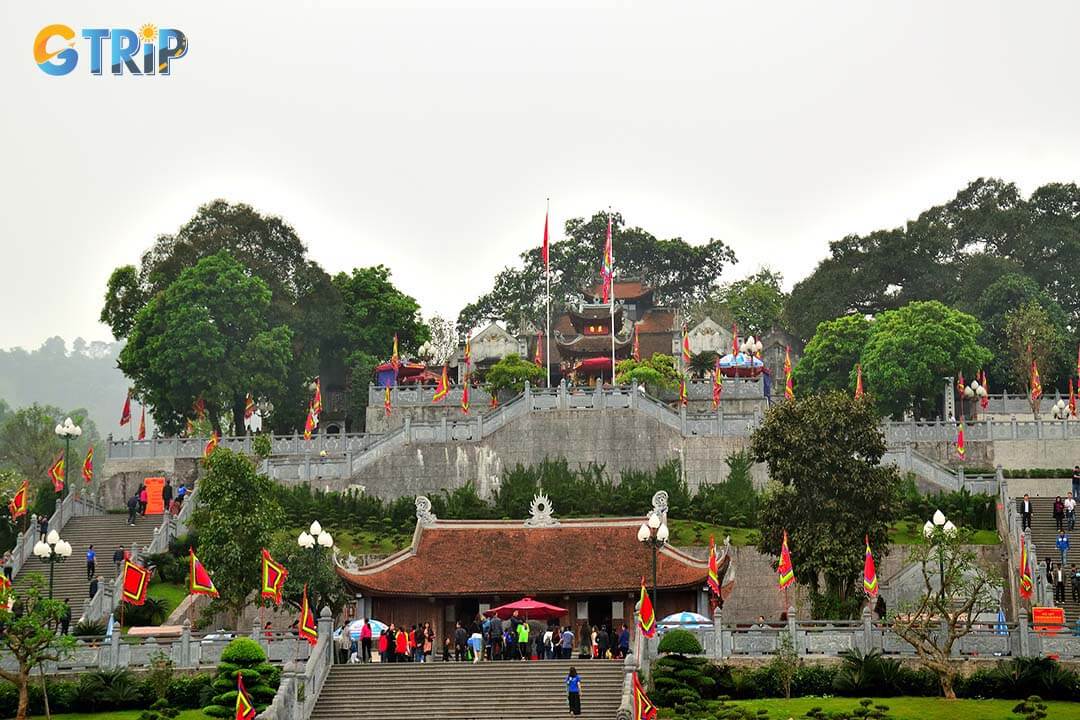 Hikers in Cua Ong Temple, offering serene views of the bay while also exploring nearby fishing villages that provide a glimpse into local life and history