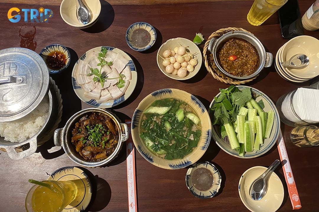 Cuc Gach Quan offers an authentic Vietnamese home-style dining experience in a beautifully restored traditional house, renowned for its extensive sharing-style menu