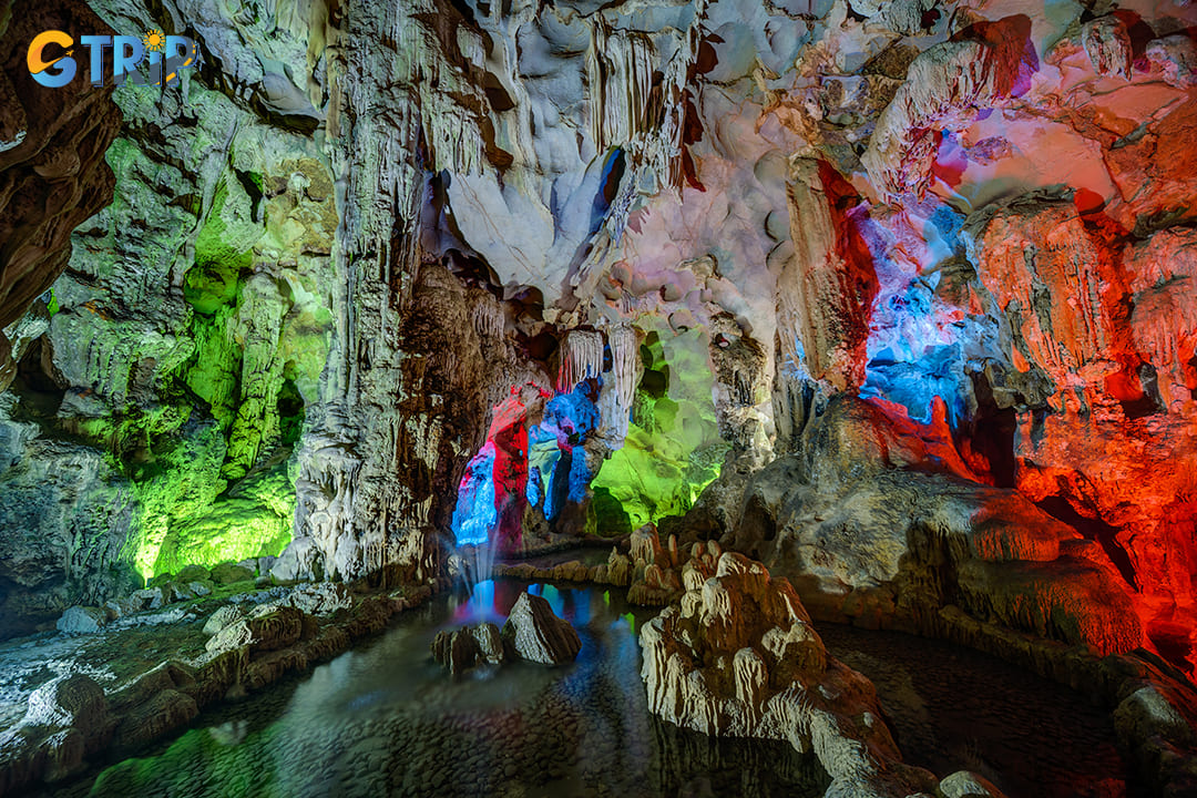 Dau Go Cave boasts three expansive chambers filled with colorful stalactites and stalagmites