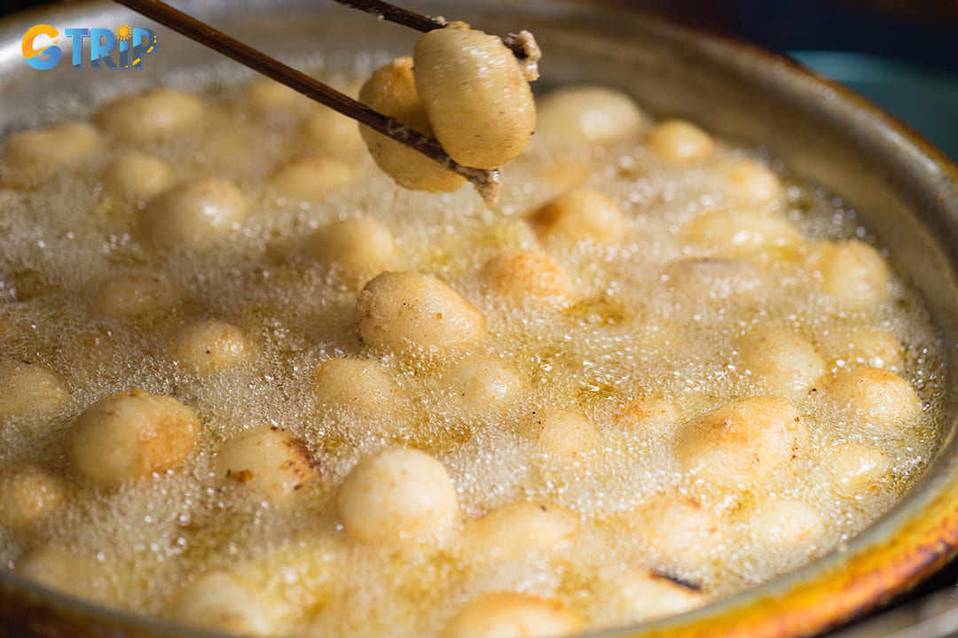 Dinh Liet Fried Cake offers a humble yet authentic street food experience