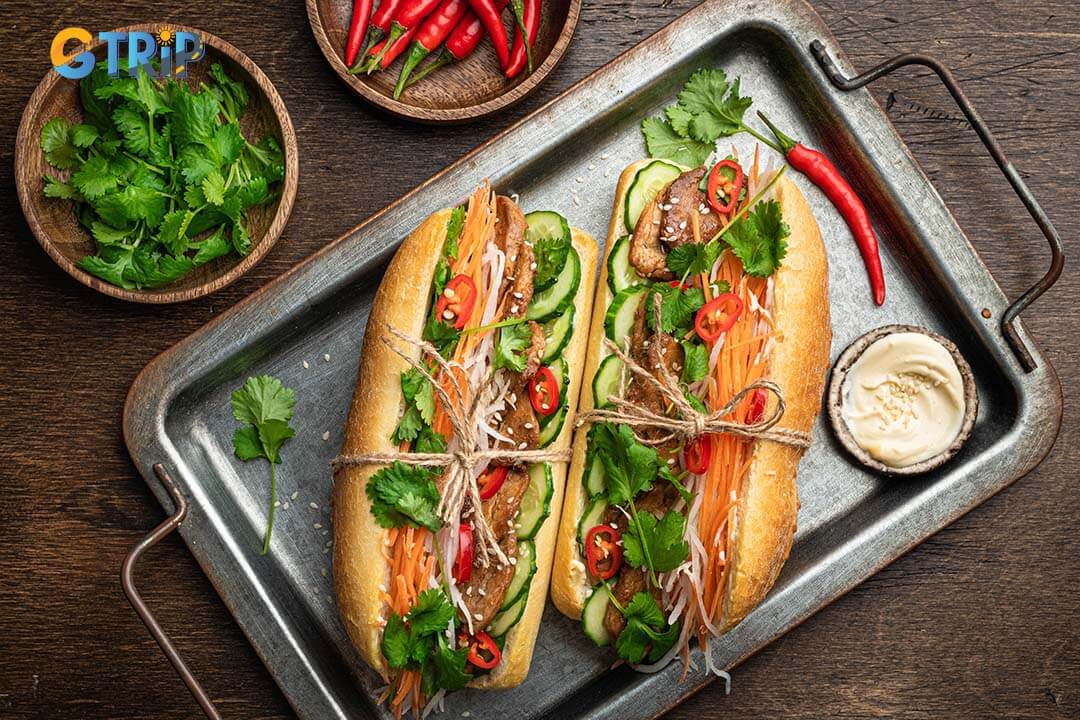 Dong Xuan Market offers two distinct vibes: a bustling day market and a festive weekend night market