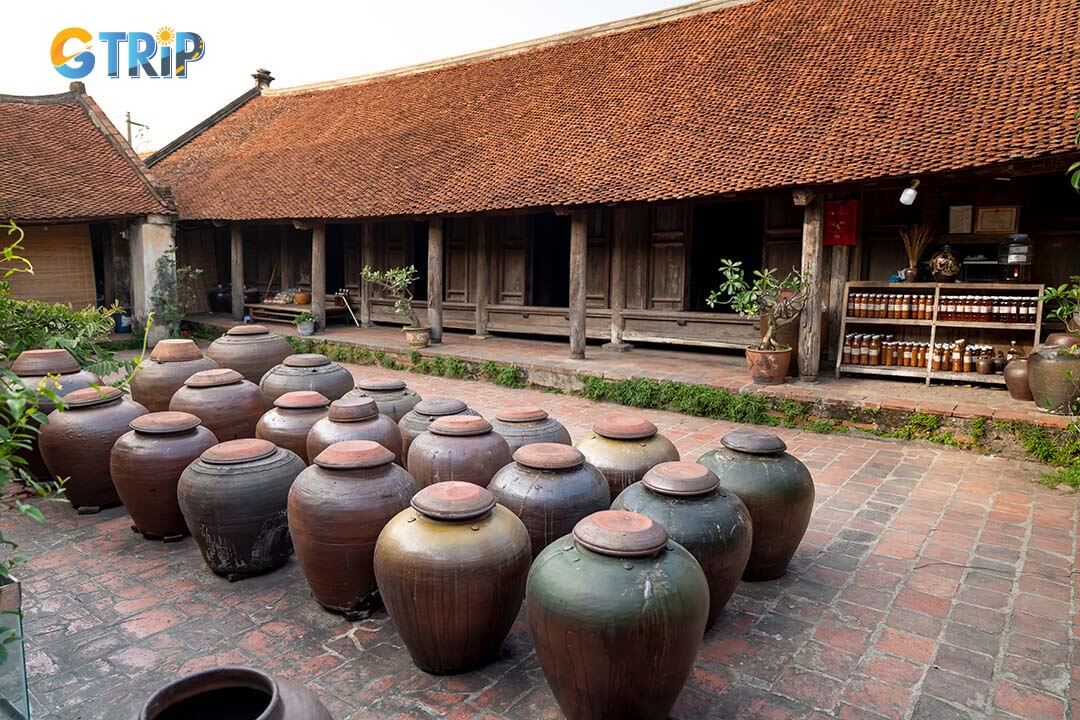 Mong Phu Communal House, a 380-year-old gem blending Vietnamese and Muong architecture, stands as a unique cultural landmark in Duong Lam Ancient Village