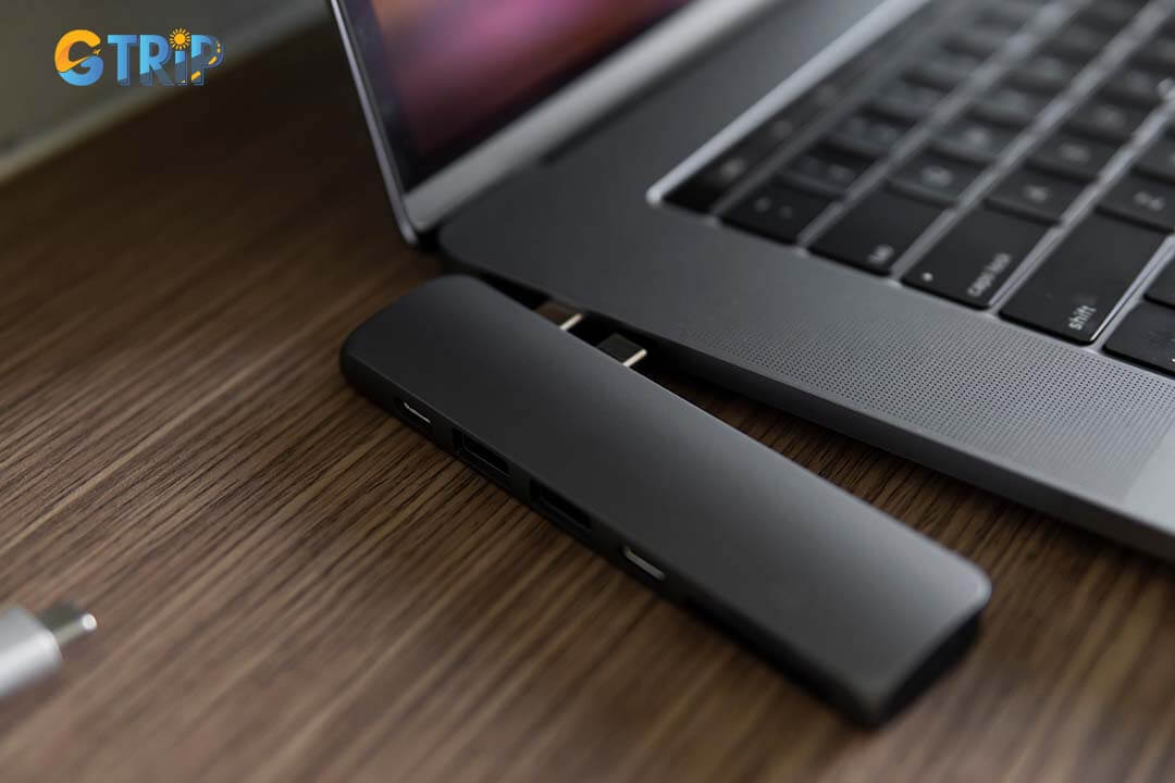 Enhance your device's connectivity with a USB-C hub featuring multiple ports for external drives, HDMI, and SD cards