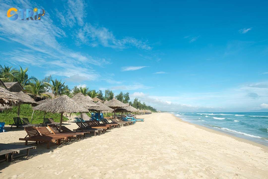 Enjoy the vibrant seaside energy of An Bang Beach, a lively stretch of golden sand known for water sports, beachfront dining, and sunset live music