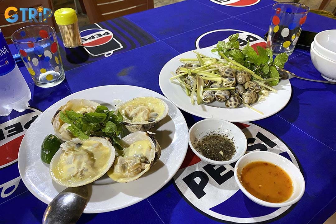 Enjoying fresh seafood is a must-do activity when visiting Ha My Beach