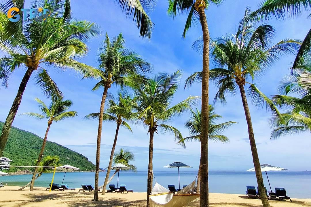 Escape the crowds on Bai Bac’s 700-meter private beach, where resort guests can relax on plush sunbeds with attentive service