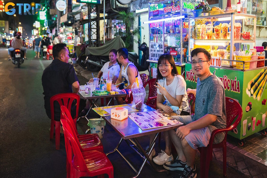 Explore Ho Chi Minh City safely and comfortably by wearing good shoes, staying hydrated, carrying cash, dressing respectfully, and wandering the alleys.