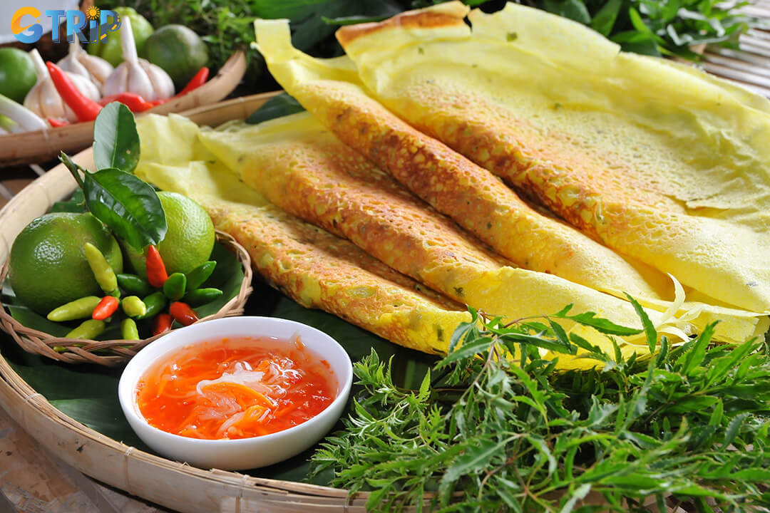 First-time Banh Xeo diners often ask about its healthiness and how to eat it properly, from balancing the fried crepe with fresh greens to using large leaves as edible wrappers