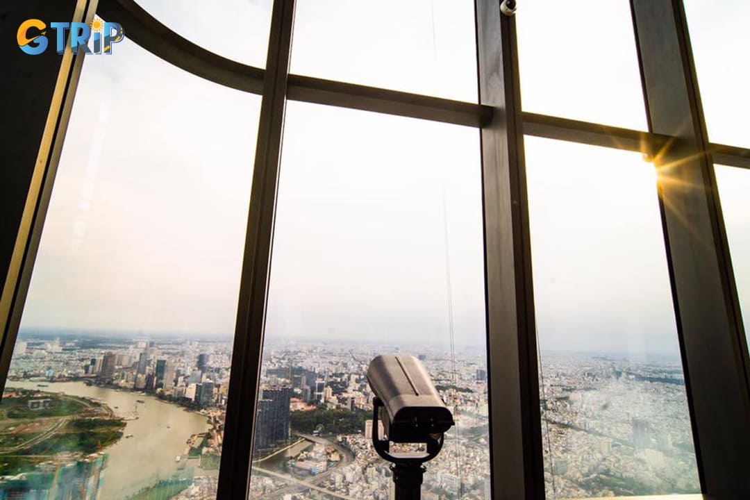 For those seeking a closer look, strategically positioned telescopes allow guests to zoom in on the vibrant city life below
