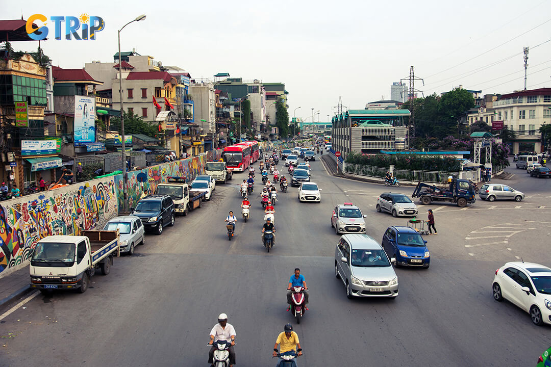 Getting to Hanoi’s iconic Ceramic Mosaic Mural is easy, with public transit, private transport, and walkable access along the scenic Red River dike