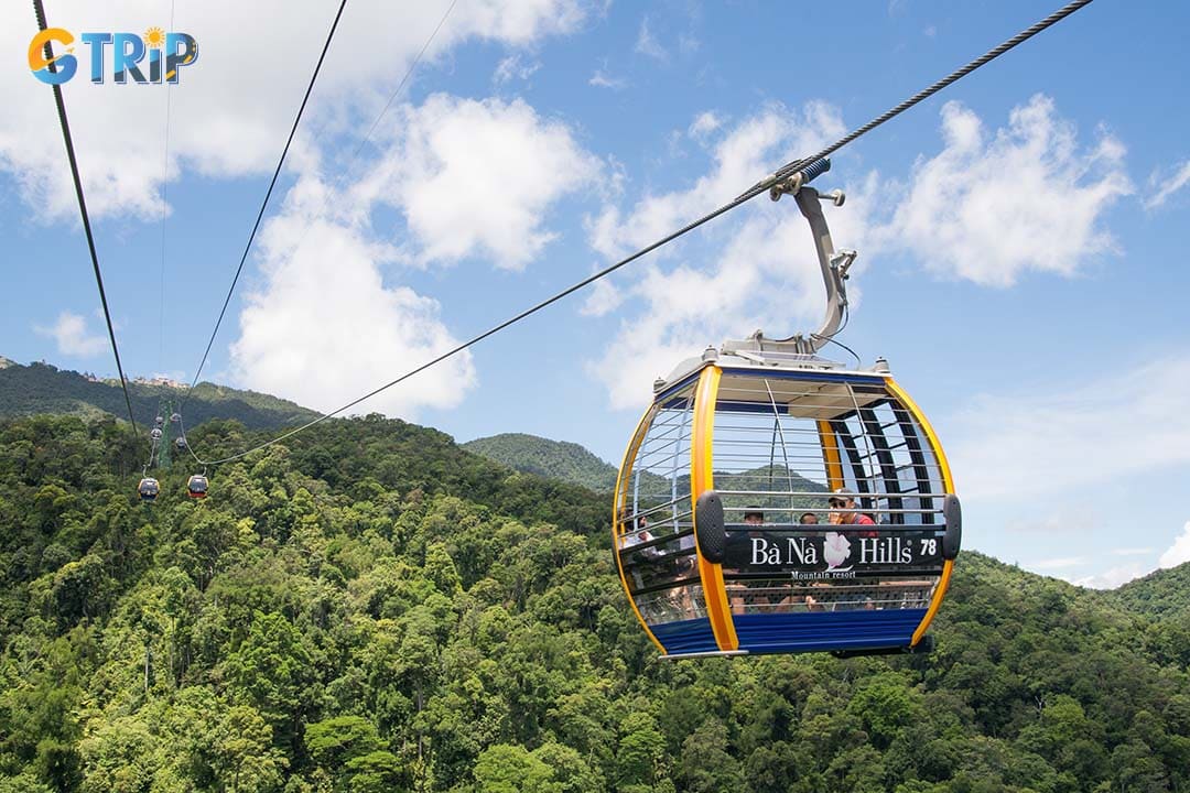 Getting to the Golden Bridge is an experience on its own, as the record-holding Ba Na Hills cable car offers breathtaking views of waterfalls, lush forests