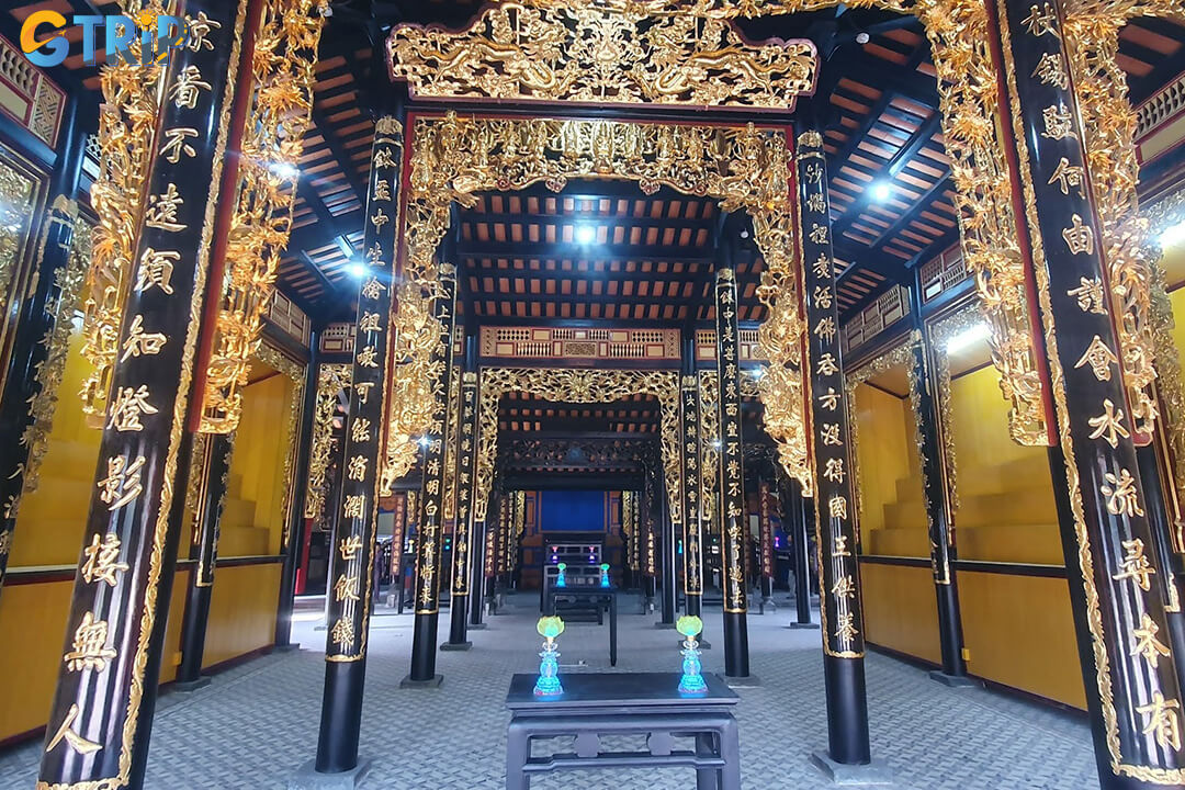Giac Vien Pagoda, a “museum of wood sculpture,” houses over 50 delicate bao lam panels depicting Buddhist tales, folklore, and daily life
