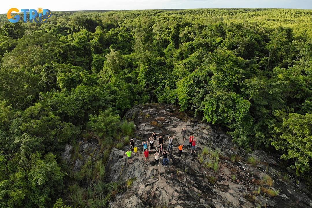 Giong Chua Hill is a meaningful rise that rewards a short climb with panoramic views over the hamlet, shimmering salt fields, and the vast green canopy of the Can Gio Mangrove Forest