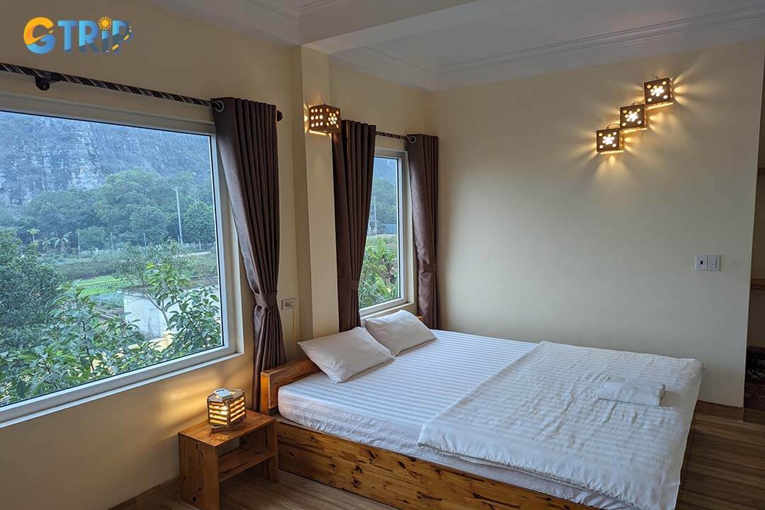 Ha Lan Homestay offers cozy rooms with private terraces, guided motorbike tours, and traditional meals, perfect for relaxation and exploration